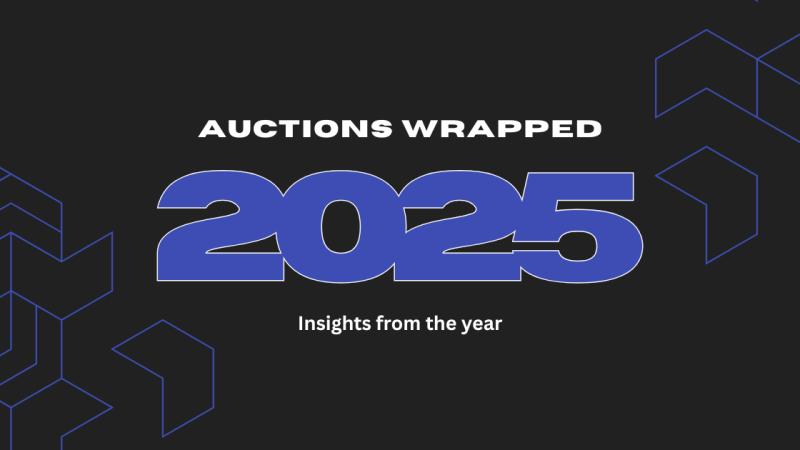 RocketBid Auctions Wrapped 2025 blog header featuring bold blue ‘2025’ text on a dark background with geometric accents.